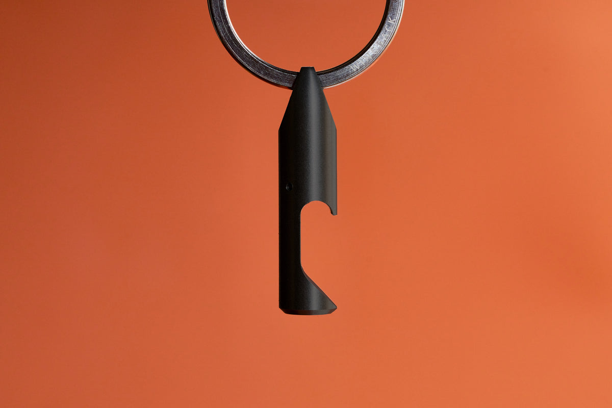 Bottle Opener - Black Steel hanging from its key ring