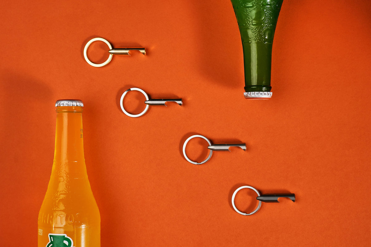 Bottle Opener in brass, steel, titanium and black steel