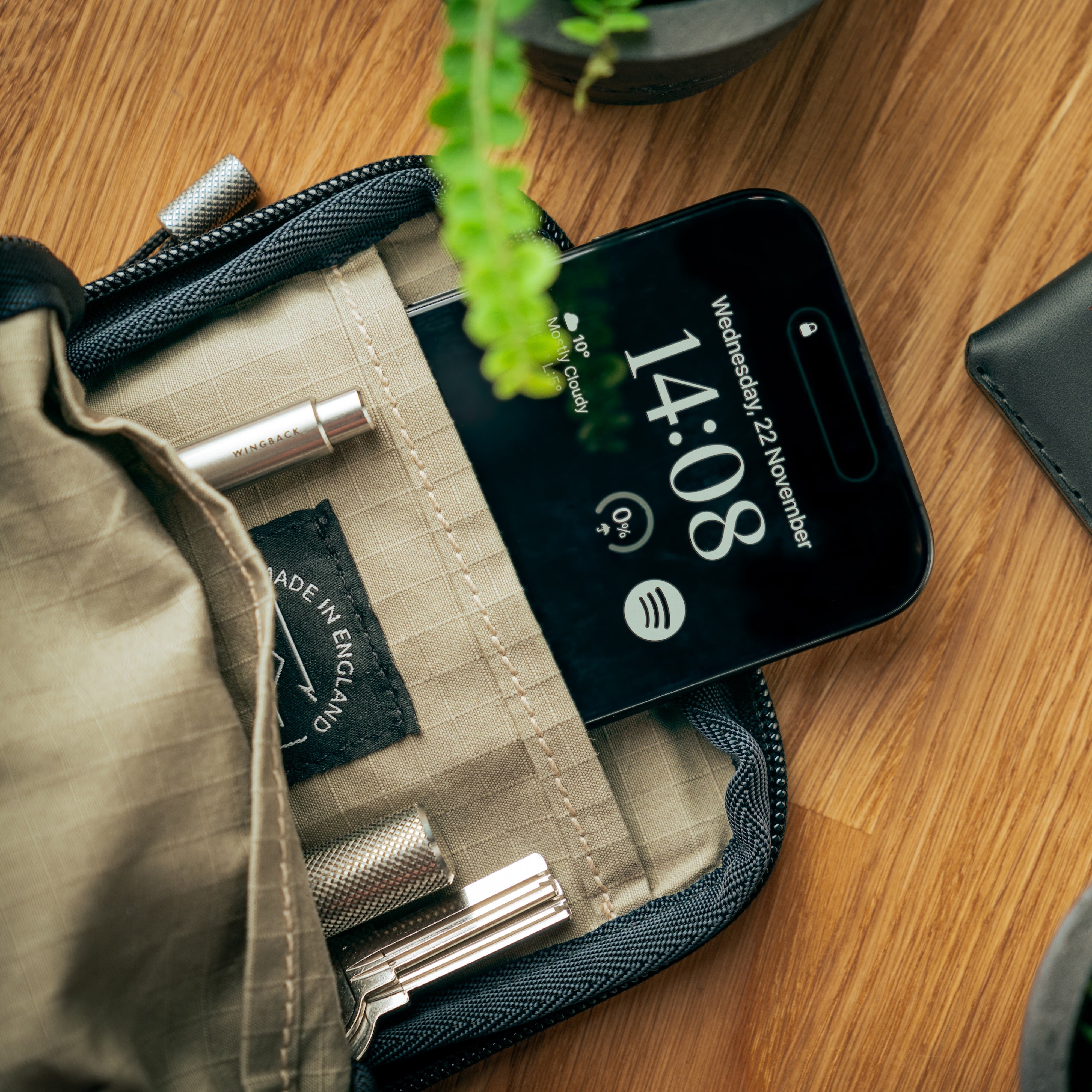 Filled pouch with phone