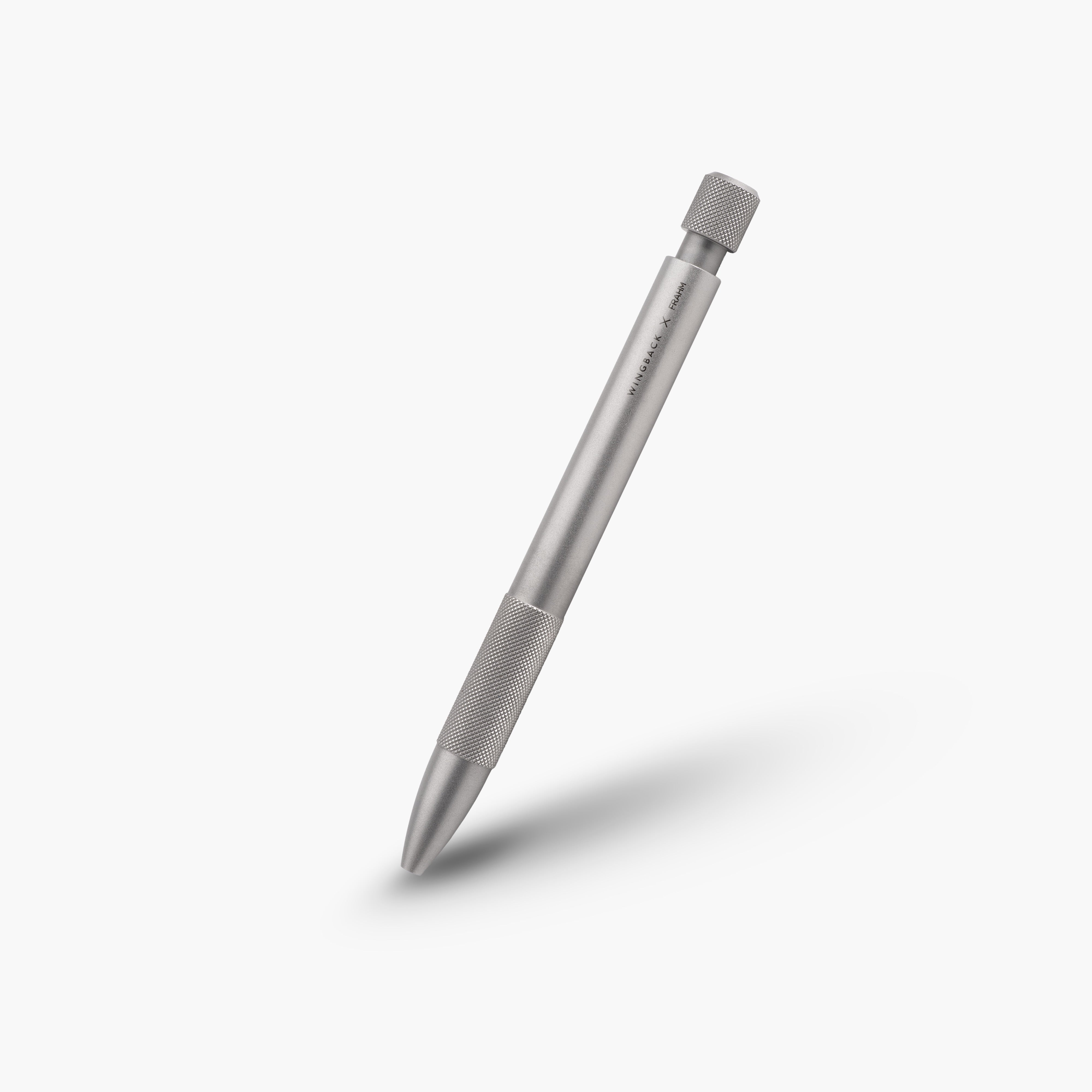 Silver pen on a white background