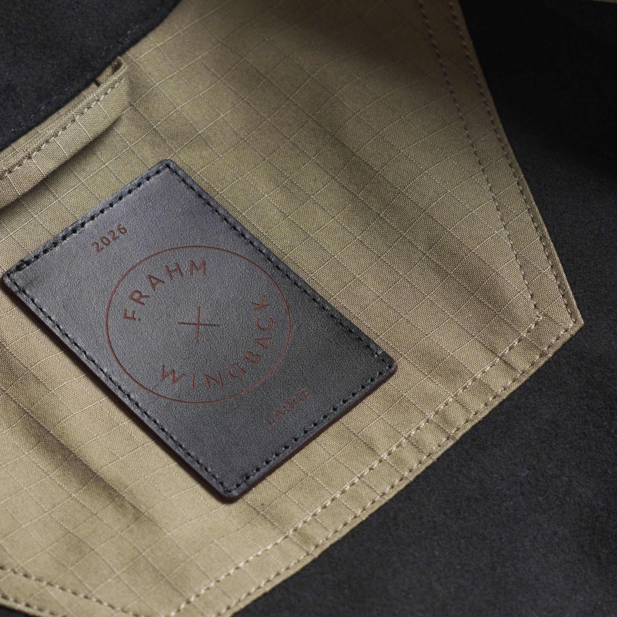 Close-up of a branded patch on a jacket