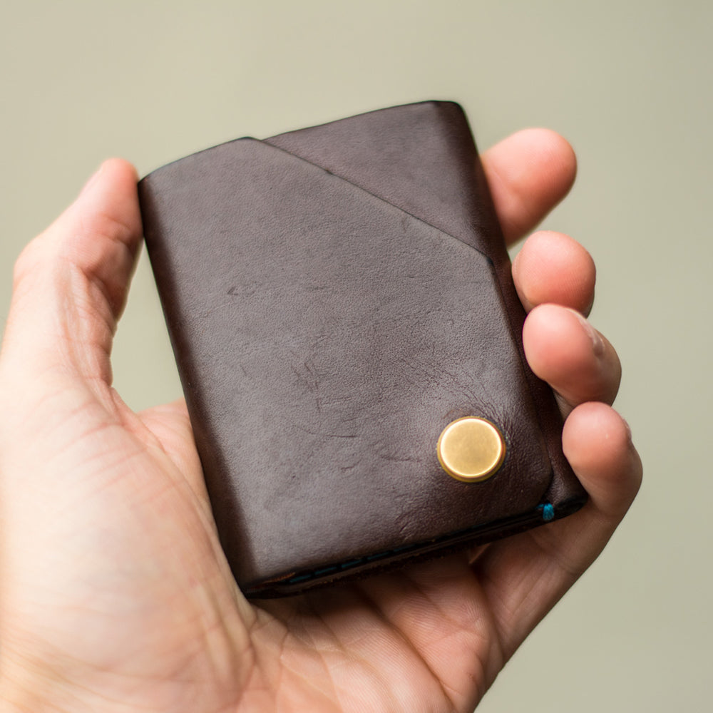 Aged brown leather wallet by Wingback