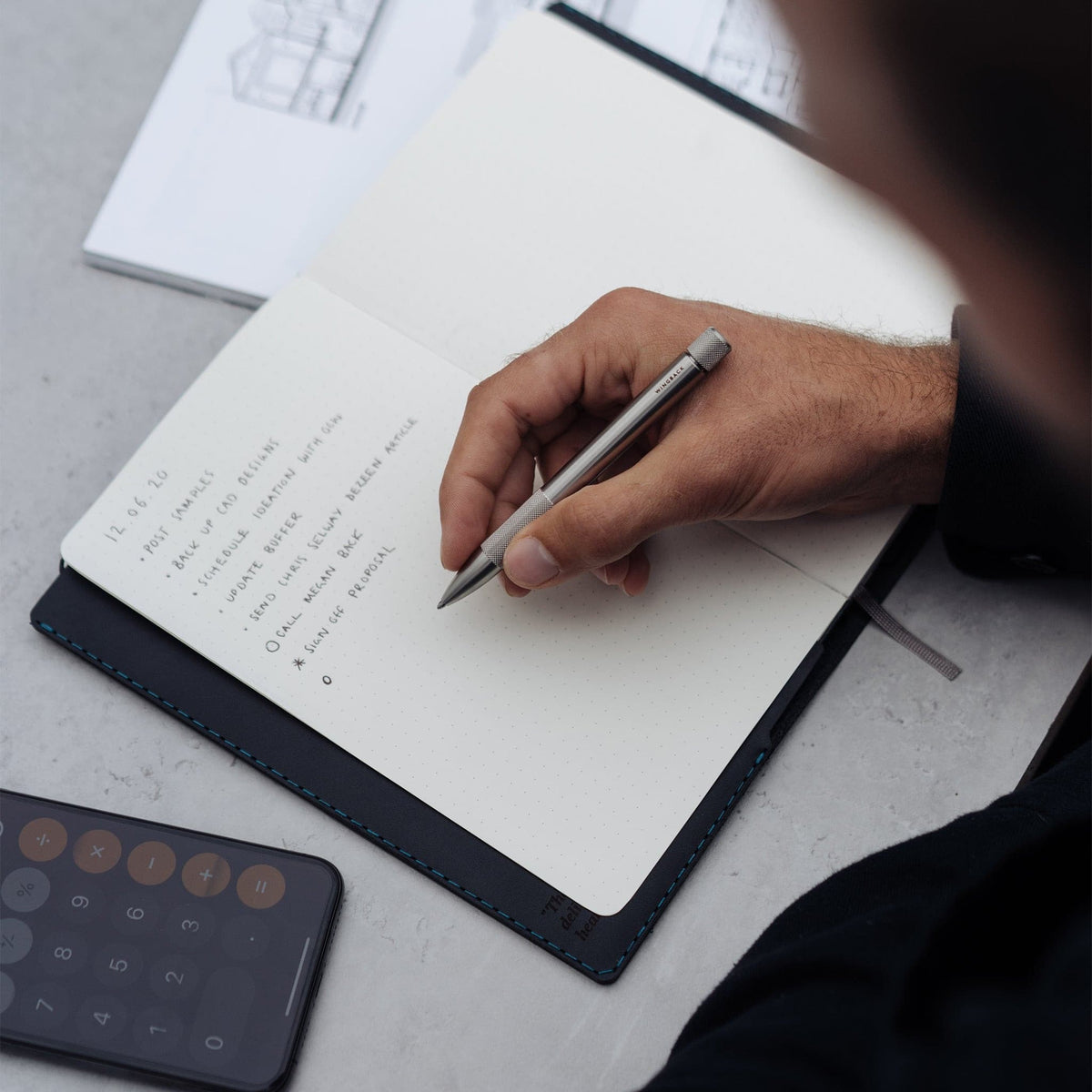 Writing on notebook