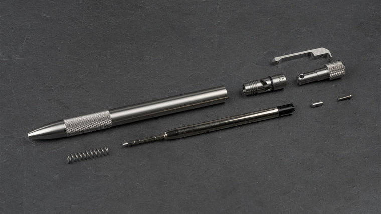 Wingback Journeyman Pen in stainless steel taken apart, showing its G2 refill, spring, clip and twist mechanism