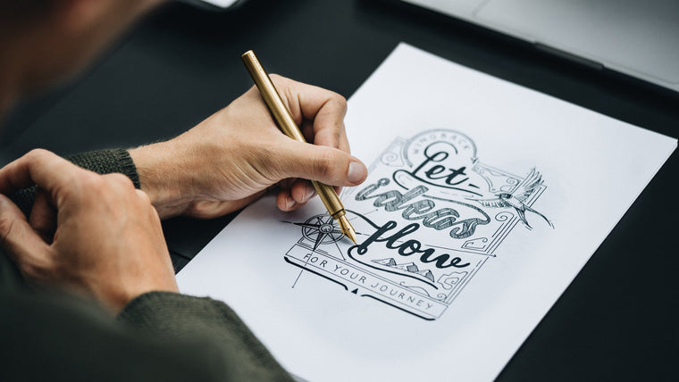 Writing with a brass Wingback Fountain Pen