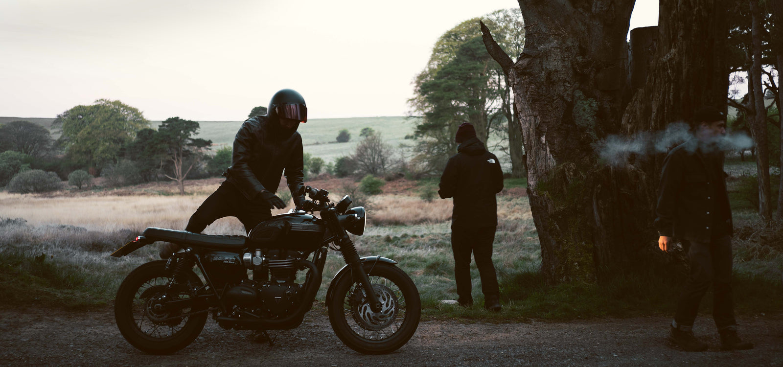 Man getting on a Triumph motorbike - on set for a short film by Wingback