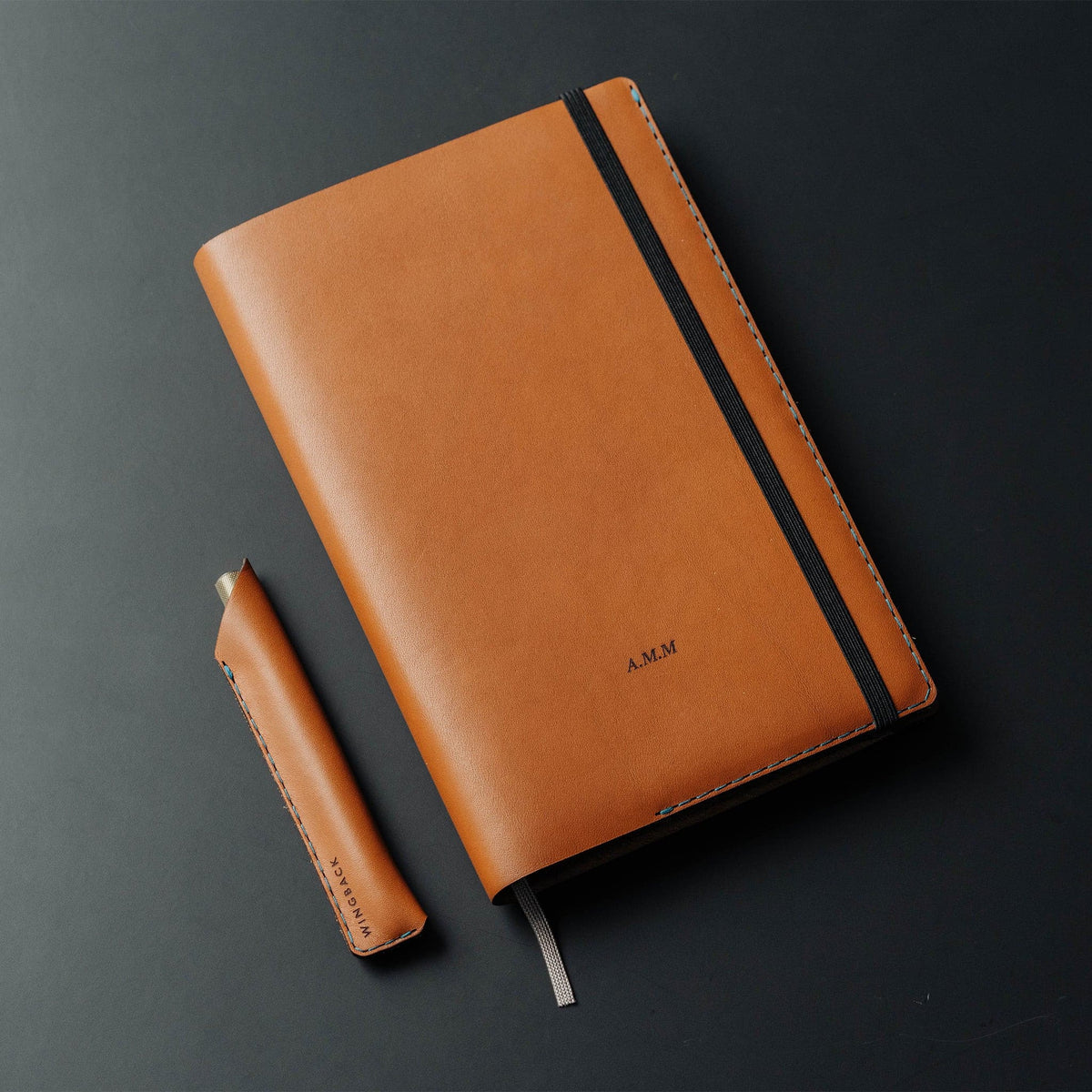 Notebook with matching pen holster
